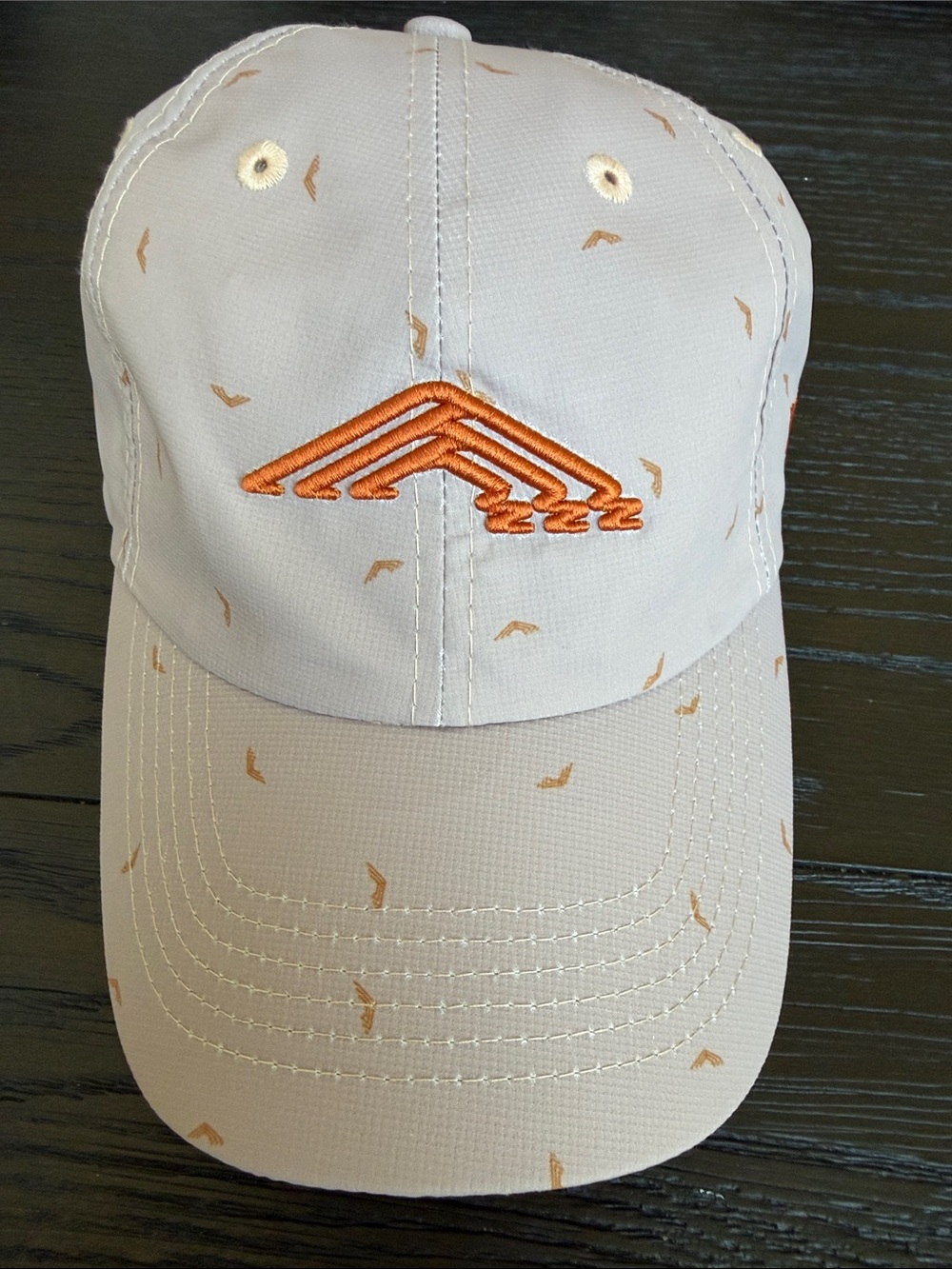 Nanea Golf Club Beige Baseball Cap with Orange Embroidered Accent